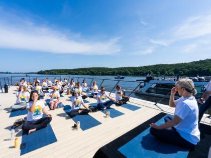 Indian Embassy in Berlin celebrates International Yoga Day with unique yacht session on Wannsee lake | Indian Embassy in Berlin celebrates International Yoga Day with unique yacht session on Wannsee lake Indian Embassy in Berlin celebrates International Yoga Day with unique yacht session on Wannsee lake | Indian Embassy in Berlin celebrates International Yoga Day with unique yacht session on Wannsee lake