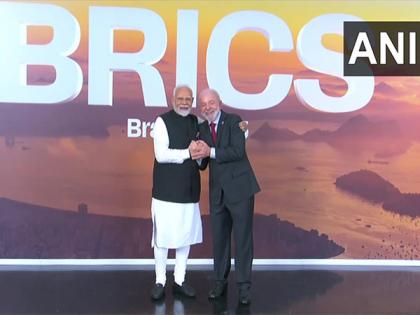 PM Modi shakes hands, shares hug with Brazil Prez, as he arrives for 17th BRICS Summit | PM Modi shakes hands, shares hug with Brazil Prez, as he arrives for 17th BRICS Summit