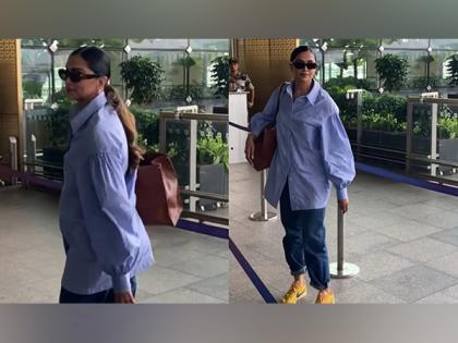 Airport diaries: Deepika Padukone stuns in a chic oversized shirt, flashes a smile as she heads to catch flight | Airport diaries: Deepika Padukone stuns in a chic oversized shirt, flashes a smile as she heads to catch flight
