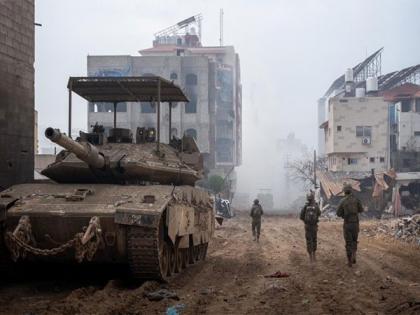 Gazans seen cheering Israeli troops overseeing aid delivery | Gazans seen cheering Israeli troops overseeing aid delivery Gazans seen cheering Israeli troops overseeing aid delivery | Gazans seen cheering Israeli troops overseeing aid delivery