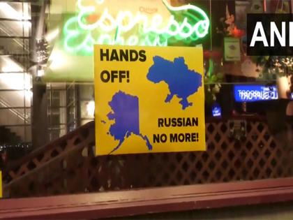"Hands off! Russia no more" posters seen in Anchorage before Trump-Putin Alaska summit | "Hands off! Russia no more" posters seen in Anchorage before Trump-Putin Alaska summit