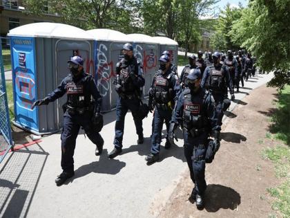 Toronto police arrest six at Christie Pits Park during pro and anti-immigration rival rallies | Toronto police arrest six at Christie Pits Park during pro and anti-immigration rival rallies