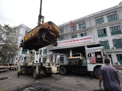 Nepal starts clearing charred vehicles, government buildings as damage assessment continues | Nepal starts clearing charred vehicles, government buildings as damage assessment continues