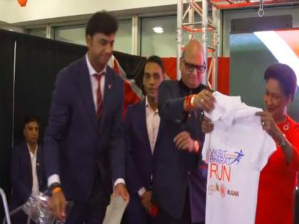 Trinidad and Tobago PM unveils Viksit Bharat Run t-shirt at Jaipur Foot USA event | Trinidad and Tobago PM unveils Viksit Bharat Run t-shirt at Jaipur Foot USA event