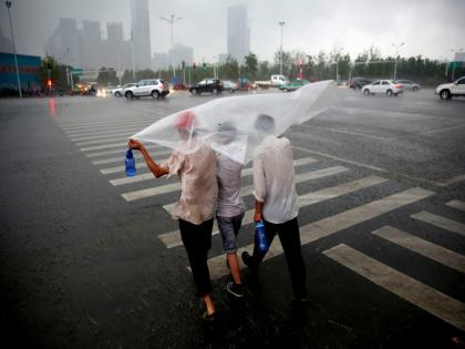 Southern China braces for 'strongest' storms as typhoon Matmo landfall nears | Southern China braces for 'strongest' storms as typhoon Matmo landfall nears