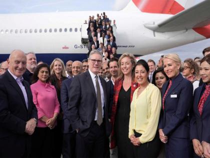 British PM Starmer joins his business delegation for a photo at London's Heathrow airport ahead of India visit | British PM Starmer joins his business delegation for a photo at London's Heathrow airport ahead of India visit