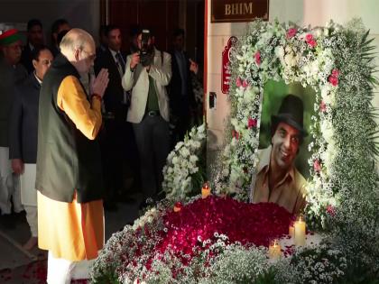 Amit Shah pays floral tribute to Dharmendra at his prayer meet in Delhi | Amit Shah pays floral tribute to Dharmendra at his prayer meet in Delhi Amit Shah pays floral tribute to Dharmendra at his prayer meet in Delhi | Amit Shah pays floral tribute to Dharmendra at his prayer meet in Delhi
