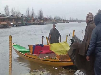 J-K: Strong winds damage shikaras at Srinagar's Dal Lake | J-K: Strong winds damage shikaras at Srinagar's Dal Lake J-K: Strong winds damage shikaras at Srinagar's Dal Lake | J-K: Strong winds damage shikaras at Srinagar's Dal Lake