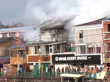 J-K: Fire breaks out at guest house in Srinagar's Dalgate | J-K: Fire breaks out at guest house in Srinagar's Dalgate J-K: Fire breaks out at guest house in Srinagar's Dalgate | J-K: Fire breaks out at guest house in Srinagar's Dalgate