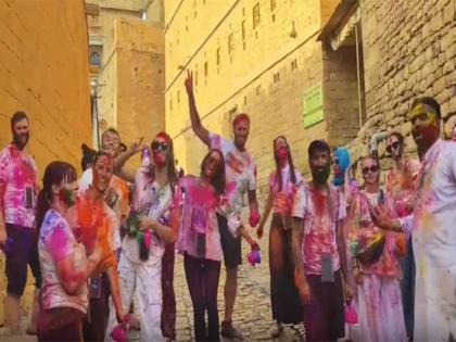 Foreign tourists immerse themselves in the colours of Holi in Jaisalmer | Foreign tourists immerse themselves in the colours of Holi in Jaisalmer Foreign tourists immerse themselves in the colours of Holi in Jaisalmer | Foreign tourists immerse themselves in the colours of Holi in Jaisalmer
