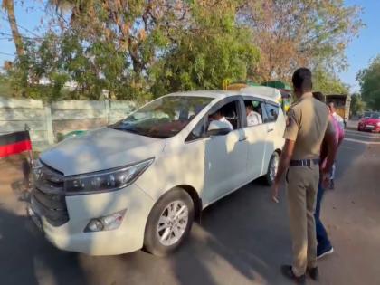 Flying squad inspect vehicles of DMK leaders ahead of Tamil Nadu assembly polls | Flying squad inspect vehicles of DMK leaders ahead of Tamil Nadu assembly polls Flying squad inspect vehicles of DMK leaders ahead of Tamil Nadu assembly polls | Flying squad inspect vehicles of DMK leaders ahead of Tamil Nadu assembly polls
