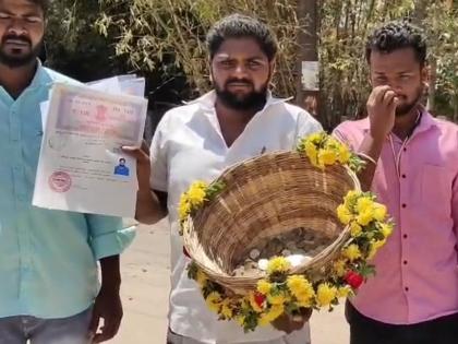 Tamil Nadu polls: Independent candidate files nomination with 'basket of coins' in Tirupattur | Tamil Nadu polls: Independent candidate files nomination with 'basket of coins' in Tirupattur Tamil Nadu polls: Independent candidate files nomination with 'basket of coins' in Tirupattur | Tamil Nadu polls: Independent candidate files nomination with 'basket of coins' in Tirupattur