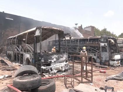 Fire guts 3 buses, few bikes at Indore parking lot; 1 lakh litres of water used to douse blaze | Fire guts 3 buses, few bikes at Indore parking lot; 1 lakh litres of water used to douse blaze Fire guts 3 buses, few bikes at Indore parking lot; 1 lakh litres of water used to douse blaze | Fire guts 3 buses, few bikes at Indore parking lot; 1 lakh litres of water used to douse blaze