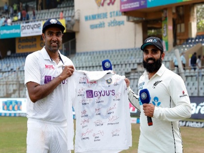Ashwin gifts Ajaz Patel his Test jersey autographed by teammates | Ashwin gifts Ajaz Patel his Test jersey autographed by teammates