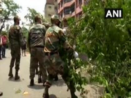 Indian Army, NDRF conduct restoration work in Kolkata after cyclone Amphan | Indian Army, NDRF conduct restoration work in Kolkata after cyclone Amphan