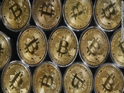 Bitcoin's market value tops $1 trillion | Bitcoin's market value tops $1 trillion