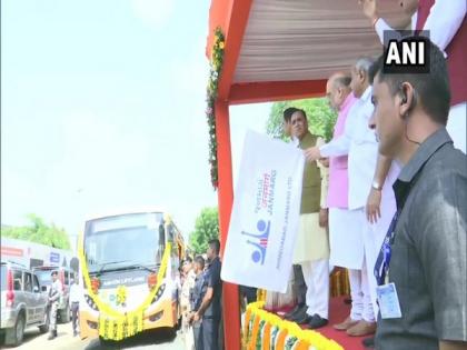 Ahmedabad: Shah flags off battery-operated buses, participates in tree plantation drive | Ahmedabad: Shah flags off battery-operated buses, participates in tree plantation drive