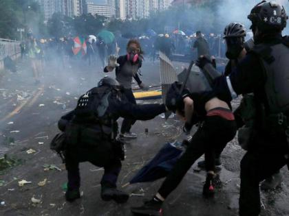 Hong Kong: 1 protestor shot as police fires at crowd on China's National Day | Hong Kong: 1 protestor shot as police fires at crowd on China's National Day Hong Kong: 1 protestor shot as police fires at crowd on China's National Day | Hong Kong: 1 protestor shot as police fires at crowd on China's National Day