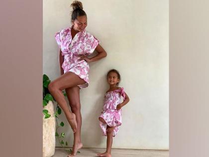 Chrissy Teigen twins with daughter Luna in pink | Chrissy Teigen twins with daughter Luna in pink