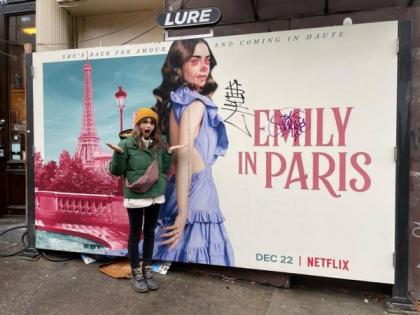 Lily Collins reacts to graffiti on poster of 'Emily in Paris' | Lily Collins reacts to graffiti on poster of 'Emily in Paris'
