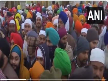 Devotees throng temples, gurudwaras on occasion of New Year | Devotees throng temples, gurudwaras on occasion of New Year
