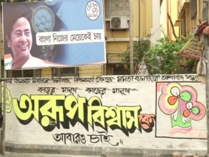 Poll fever goes high with wall paintings in Kolkata streets | Poll fever goes high with wall paintings in Kolkata streets