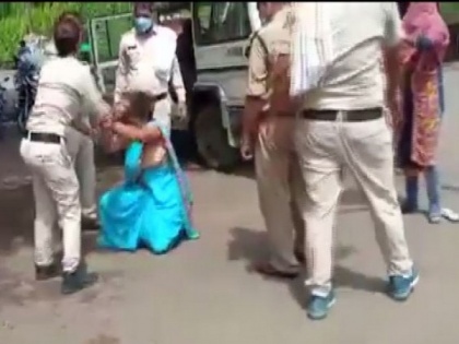 Madhya Pradesh: Police trash woman for not wearing mask, 2 cops suspended | Madhya Pradesh: Police trash woman for not wearing mask, 2 cops suspended