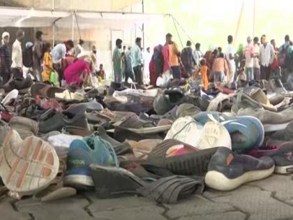 People leave shoes, clothes on footpath in Bhopal for those in need | People leave shoes, clothes on footpath in Bhopal for those in need