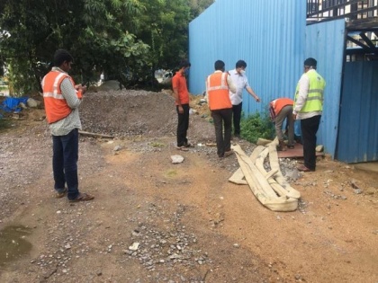 GHMC fines building Rs 1 lakh for pumping cellar water on main road in Telangana | GHMC fines building Rs 1 lakh for pumping cellar water on main road in Telangana