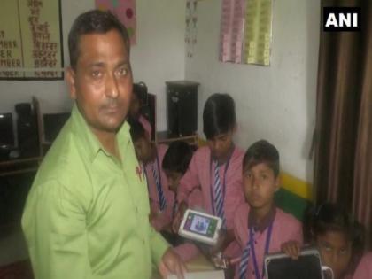 Bhadohi school principal provides tablets to students bought with his salary | Bhadohi school principal provides tablets to students bought with his salary Bhadohi school principal provides tablets to students bought with his salary | Bhadohi school principal provides tablets to students bought with his salary