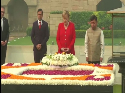 German Chancellor pays floral tribute to Mahatma Gandhi at Rajghat | German Chancellor pays floral tribute to Mahatma Gandhi at Rajghat