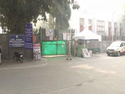 AAP workers deployed outside strongrooms to keep vigil on EVMs | AAP workers deployed outside strongrooms to keep vigil on EVMs AAP workers deployed outside strongrooms to keep vigil on EVMs | AAP workers deployed outside strongrooms to keep vigil on EVMs