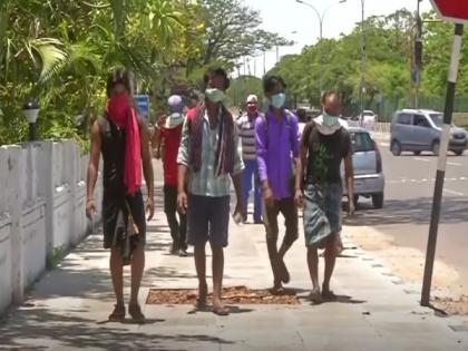 Migrants working in Madurai walk to Chennai to get train to Bihar | Migrants working in Madurai walk to Chennai to get train to Bihar
