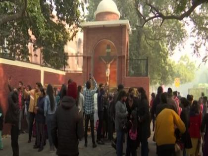 COVID-19: Delhi's Sacred Heart Cathedral remains close, people light candles at back gate | COVID-19: Delhi's Sacred Heart Cathedral remains close, people light candles at back gate COVID-19: Delhi's Sacred Heart Cathedral remains close, people light candles at back gate | COVID-19: Delhi's Sacred Heart Cathedral remains close, people light candles at back gate
