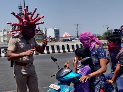 Corona helmet, Chennai cops' unique way to dissuade lockdown defiers | Corona helmet, Chennai cops' unique way to dissuade lockdown defiers