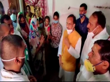 UP Deputy CM Dinesh Sharma meets slain sub-inspector's family, hands over cheque of Rs 1 crore | UP Deputy CM Dinesh Sharma meets slain sub-inspector's family, hands over cheque of Rs 1 crore