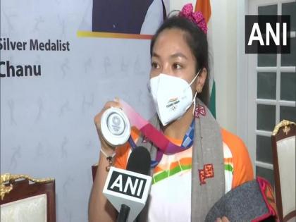 Mirabai Chanu dedicates Olympic medal to India, thanks PM Modi for encouragment | Mirabai Chanu dedicates Olympic medal to India, thanks PM Modi for encouragment