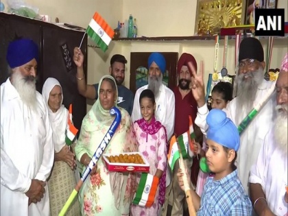 Tokyo Olympics: Gurjit Kaur's family exchanges sweets in Amritsar post India's win | Tokyo Olympics: Gurjit Kaur's family exchanges sweets in Amritsar post India's win