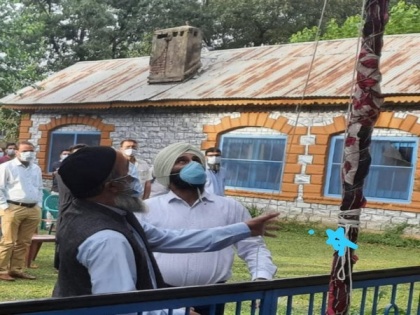 Independence Day: Slain terrorist Burhan Wani's father hoists national flag in J-K's Pulwama | Independence Day: Slain terrorist Burhan Wani's father hoists national flag in J-K's Pulwama