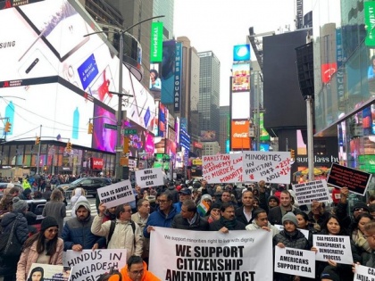 US: Members of Indian diaspora march at Times Square in support of CAA | US: Members of Indian diaspora march at Times Square in support of CAA