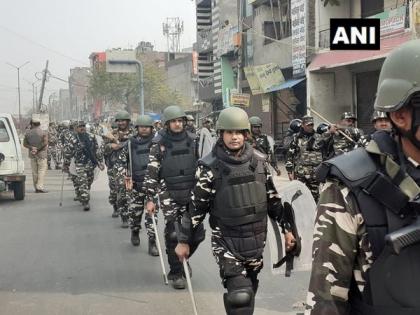 Delhi violence: Security personnel conduct flag march in Babarpur area | Delhi violence: Security personnel conduct flag march in Babarpur area Delhi violence: Security personnel conduct flag march in Babarpur area | Delhi violence: Security personnel conduct flag march in Babarpur area