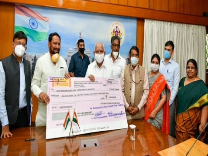 Karnataka road transport corporations' employees contribute day's salary to CM Covid Relief Fund | Karnataka road transport corporations' employees contribute day's salary to CM Covid Relief Fund