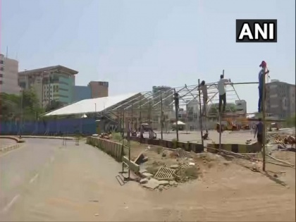 Construction of 1000 bedded COVID-19 hospital begins at MMRDA grounds in Mumbai | Construction of 1000 bedded COVID-19 hospital begins at MMRDA grounds in Mumbai