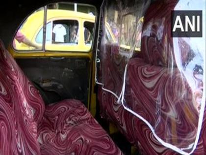 COVID-19: Kolkata cabs get plastic partition to ensure safety of driver, passengers | COVID-19: Kolkata cabs get plastic partition to ensure safety of driver, passengers COVID-19: Kolkata cabs get plastic partition to ensure safety of driver, passengers | COVID-19: Kolkata cabs get plastic partition to ensure safety of driver, passengers