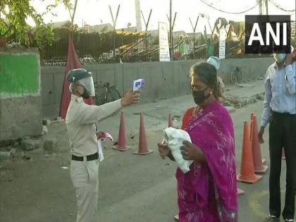 People arriving at Delhi's Okhla market screened for fever | People arriving at Delhi's Okhla market screened for fever