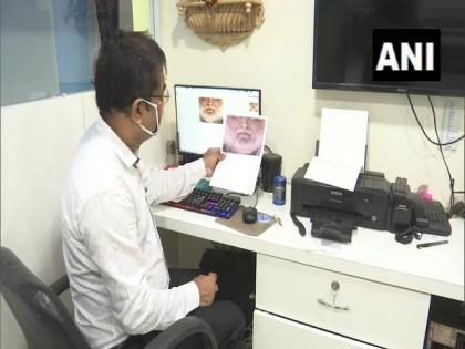 Gujarat photographer sells customised masks with face printed on it | Gujarat photographer sells customised masks with face printed on it