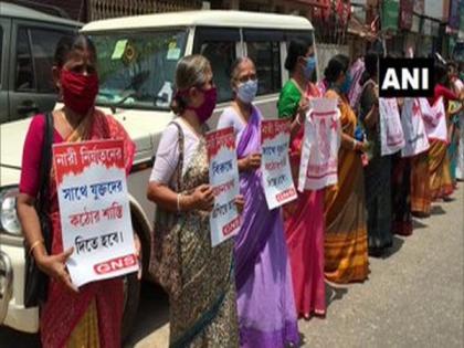 Activists in Agartala protest against rise in atrocities against women during lockdown | Activists in Agartala protest against rise in atrocities against women during lockdown