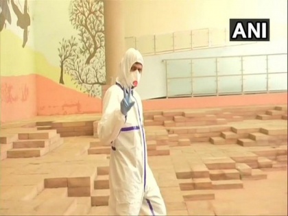 COVID-19 positive Madhya Pradesh lawmaker shows up in PPE to cast vote in RS polls | COVID-19 positive Madhya Pradesh lawmaker shows up in PPE to cast vote in RS polls