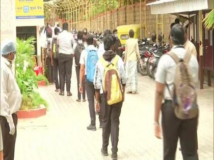 Students reach college for second PUC exam in Karnataka | Students reach college for second PUC exam in Karnataka
