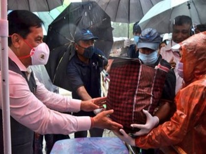 Assam CM visits flood and erosion-hit areas; distributes relief material | Assam CM visits flood and erosion-hit areas; distributes relief material